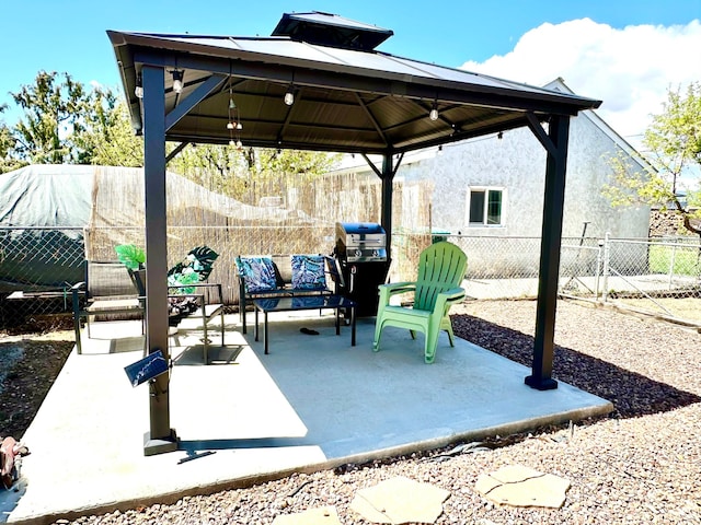 439 E 400 S, Vernal, UT 84078 - view of patio / terrace with a gazebo, an outdoor living space, and a fenced backyard