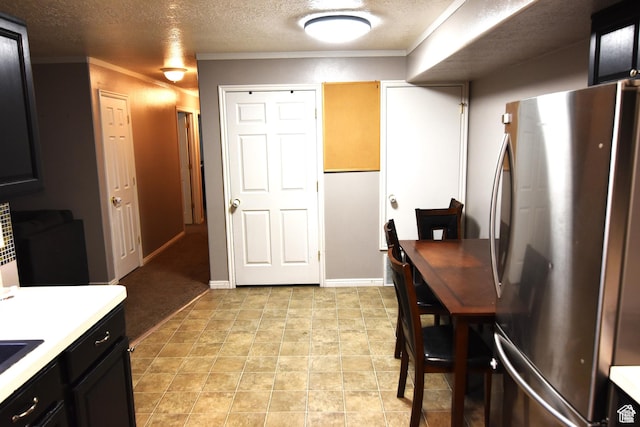8196 N Cedar Springs Rd Unit 1, Eagle Mountain, UT 84005 - dining area with baseboards, ornamental molding, and a textured ceiling
