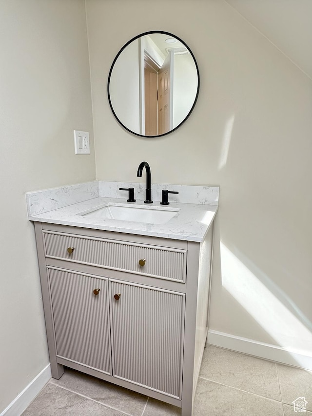 120 S 200 E, Castle Dale, UT 84513 - bathroom featuring vanity, tile patterned floors, and baseboards