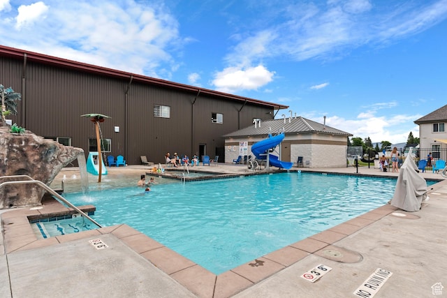 140 W 150th St S Unit D12, Garden City, UT 84028 - pool featuring fence, a water slide, and a patio area