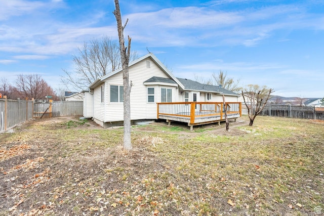 7898 N Tinamous Rd, Eagle Mountain, UT 84005 - back of property with a yard, a fenced backyard, and a wooden deck