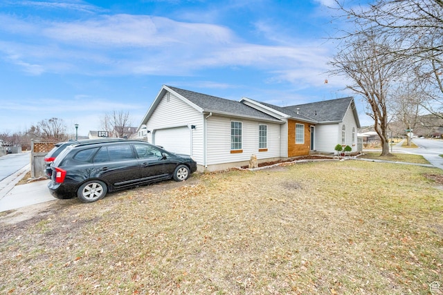 7898 N Tinamous Rd, Eagle Mountain, UT 84005 - view of home's exterior with a garage, a yard, and a shingled roof
