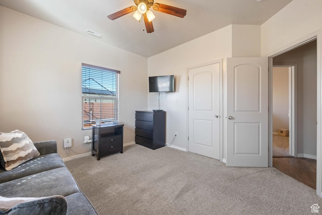265 E Kimball Ct, Washington, UT 84780 - carpeted living area featuring visible vents, baseboards, a ceiling fan, and vaulted ceiling