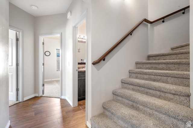 265 E Kimball Ct, Washington, UT 84780 - staircase featuring wood finished floors and baseboards