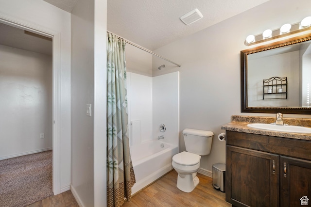 265 E Kimball Ct, Washington, UT 84780 - full bathroom featuring visible vents, toilet, shower / tub combo, wood finished floors, and vanity