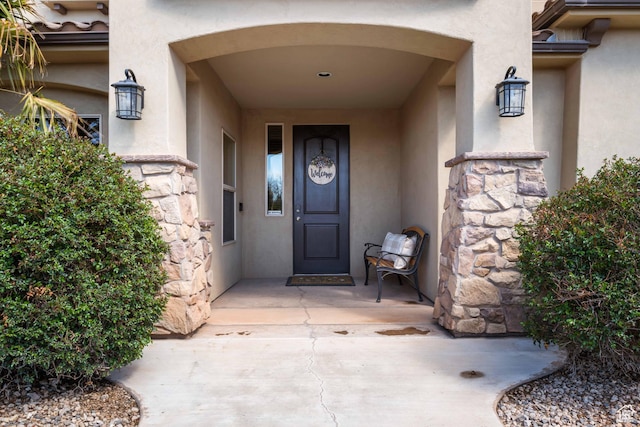 265 E Kimball Ct, Washington, UT 84780 - view of exterior entry with stucco siding and stone siding