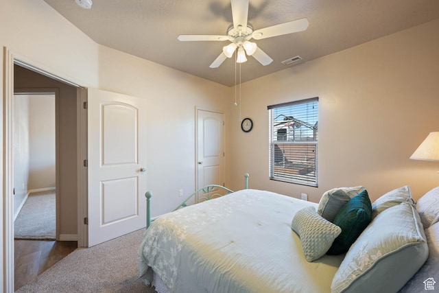 265 E Kimball Ct, Washington, UT 84780 - carpeted bedroom featuring visible vents and a ceiling fan