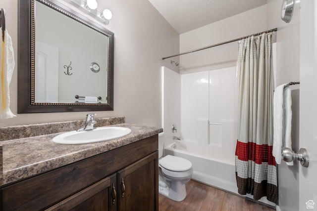 265 E Kimball Ct, Washington, UT 84780 - full bath featuring vanity, wood finished floors, shower / bath combo, a textured ceiling, and toilet
