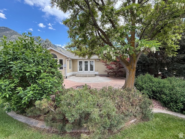 1164 E 2650 N, North Ogden, UT 84414 - rear view of property featuring french doors, stucco siding, and a patio