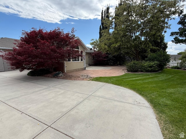 1164 E 2650 N, North Ogden, UT 84414 - view of property exterior with a yard and a patio