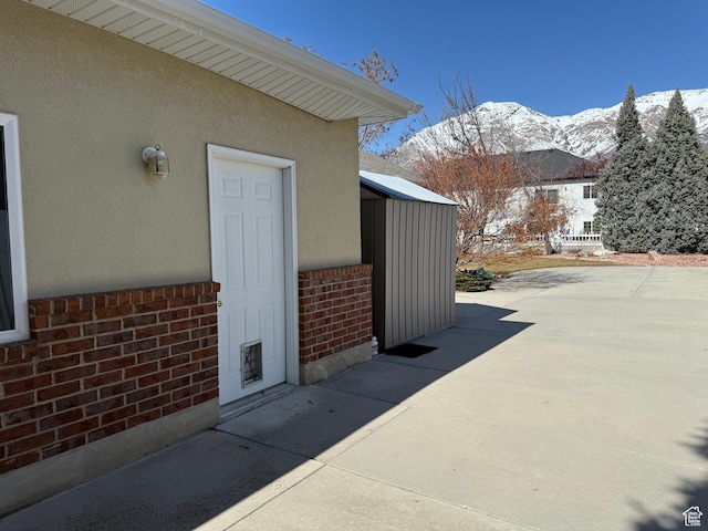 view of patio with a mountain view