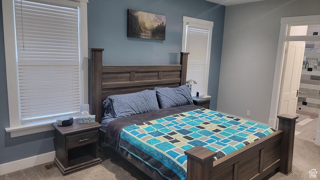 596 W 200 S, Vernal, UT 84078 - carpeted bedroom featuring baseboards and ensuite bathroom