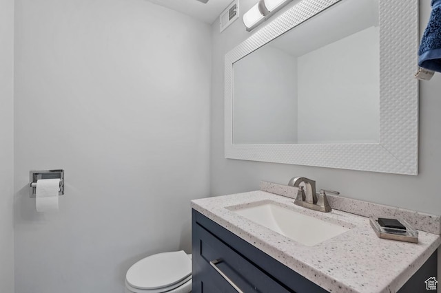 521 E 5th Ave Unit 206, Salt Lake City, UT 84103 - bathroom with visible vents, toilet, and vanity