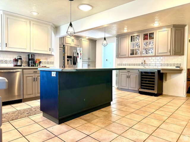 384 S 350 W, Vernal, UT 84078 - kitchen with stainless steel appliances, tasteful backsplash, gray cabinetry, and recessed lighting