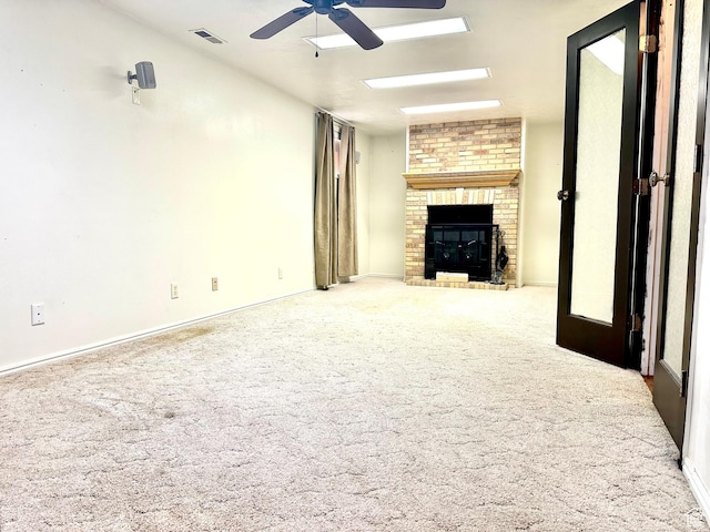 384 S 350 W, Vernal, UT 84078 - unfurnished living room featuring ceiling fan, a fireplace, carpet floors, and baseboards