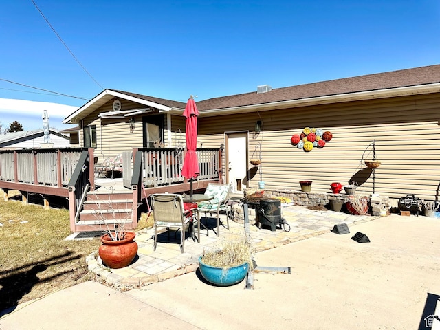 384 S 350 W, Vernal, UT 84078 - back of house with a wooden deck and a patio area