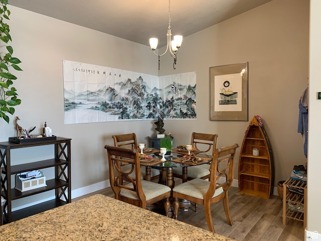 1128 S 820 E Unit 7304, Heber City, UT 84032 - dining room featuring baseboards, an inviting chandelier, and wood finished floors