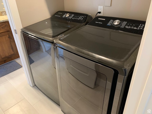 1128 S 820 E Unit 7304, Heber City, UT 84032 - clothes washing area featuring light tile patterned floors, separate washer and dryer, and laundry area