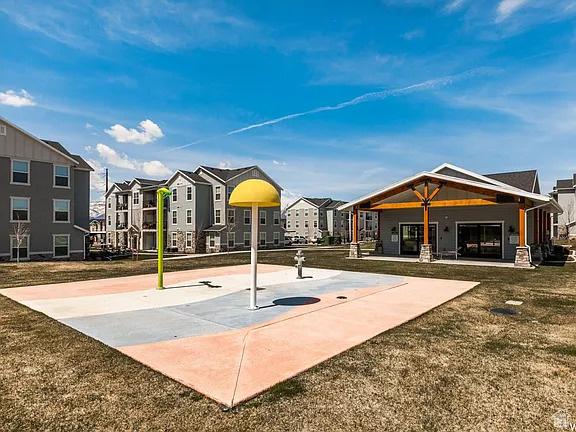 1128 S 820 E Unit 7304, Heber City, UT 84032 - surrounding community with a residential view, a lawn, and community basketball court