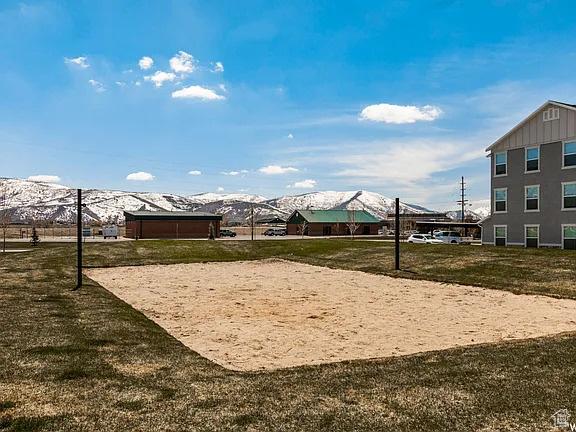 1128 S 820 E Unit 7304, Heber City, UT 84032 - view of property's community featuring a mountain view and volleyball court