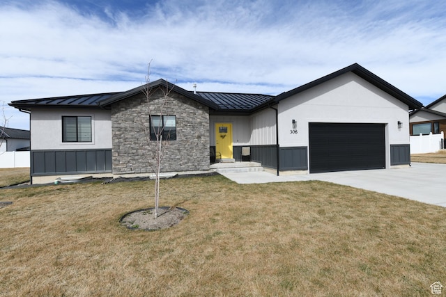 306 W 450 S, Ephraim, UT 84627 - modern inspired farmhouse with a standing seam roof, an attached garage, a metal roof, and concrete driveway