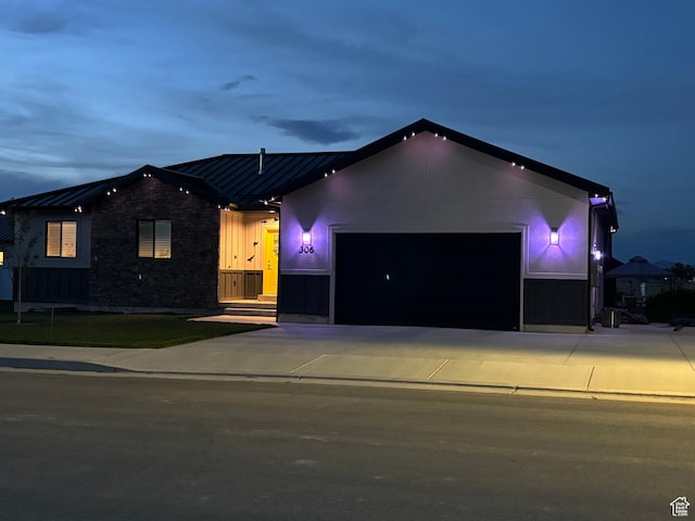 306 W 450 S, Ephraim, UT 84627 - ranch-style home featuring driveway, an attached garage, stone siding, a standing seam roof, and a metal roof