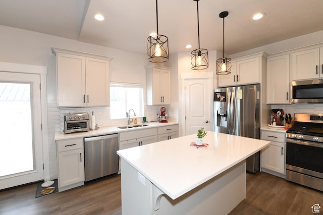 306 W 450 S, Ephraim, UT 84627 - kitchen featuring appliances with stainless steel finishes, tasteful backsplash, light countertops, recessed lighting, and a center island