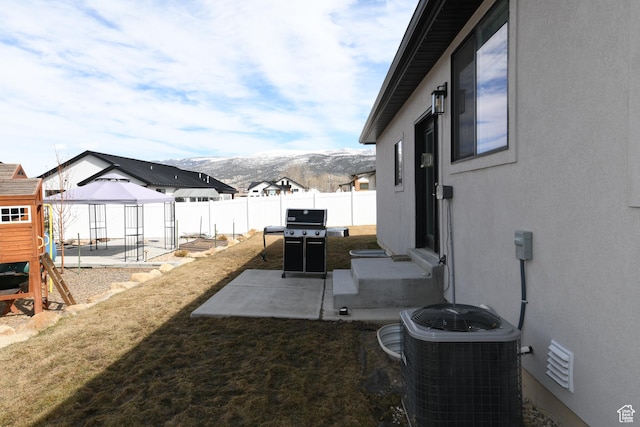 306 W 450 S, Ephraim, UT 84627 - fenced backyard featuring a gazebo, a patio, a mountain view, and entry steps