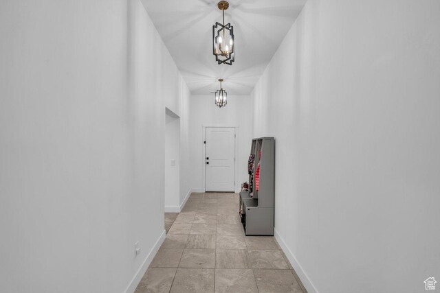 3231 S 300 W, Washington, UT 84780 - corridor featuring baseboards and a notable chandelier