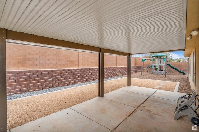 3231 S 300 W, Washington, UT 84780 - view of patio featuring a fenced backyard and a playground