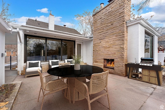 130 E 200 S, Provo, UT 84606 - view of patio with outdoor dining space and an outdoor stone fireplace