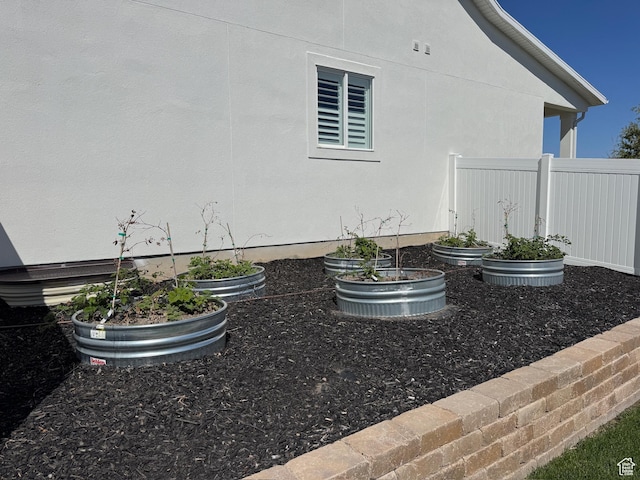 134 E Marciano Way, Grantsville, UT 84029 - view of yard featuring fence and a vegetable garden