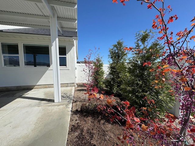 134 E Marciano Way, Grantsville, UT 84029 - exterior space with a shingled roof and a patio