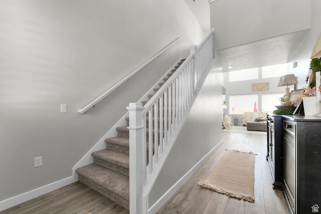 134 E Marciano Way, Grantsville, UT 84029 - staircase featuring wood finished floors and baseboards