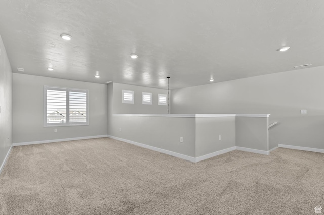 134 E Marciano Way, Grantsville, UT 84029 - empty room with light carpet, baseboards, and recessed lighting