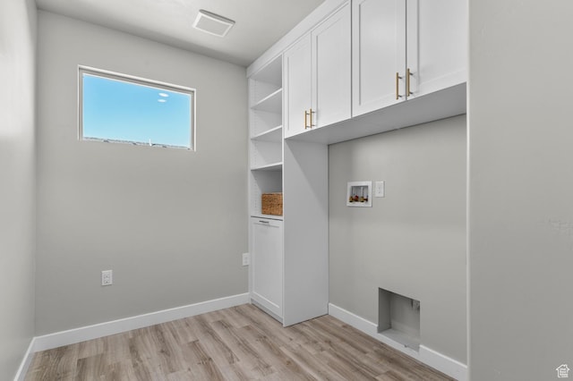 134 E Marciano Way, Grantsville, UT 84029 - clothes washing area with cabinet space, light wood-type flooring, visible vents, baseboards, and hookup for a washing machine