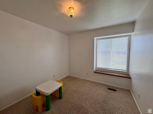 2602 W 1800 S, West Haven, UT 84401 - carpeted spare room featuring a textured ceiling, baseboards, and visible vents