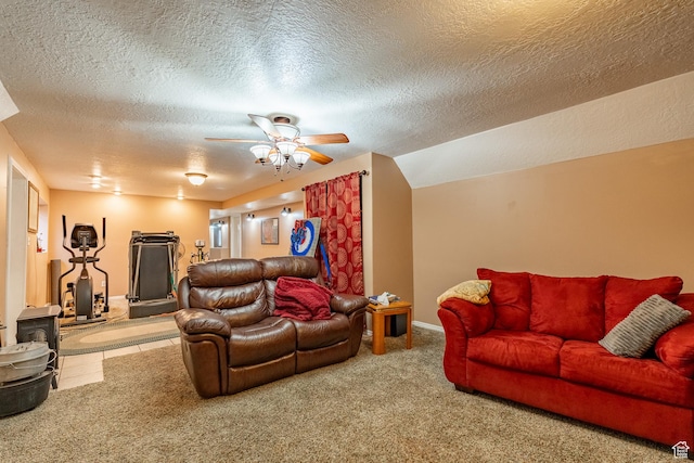 2602 W 1800 S, West Haven, UT 84401 - living area with a textured ceiling, a wood stove, lofted ceiling, carpet, and ceiling fan