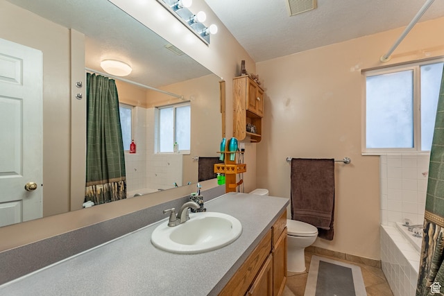 2602 W 1800 S, West Haven, UT 84401 - bathroom with vanity, tiled shower / bath, tile patterned flooring, toilet, and visible vents
