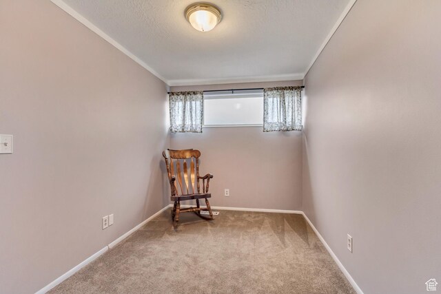 203 W Pheasantbrook Dr N, Centerville, UT 84014 - living area featuring baseboards, carpet floors, a textured ceiling, and crown molding