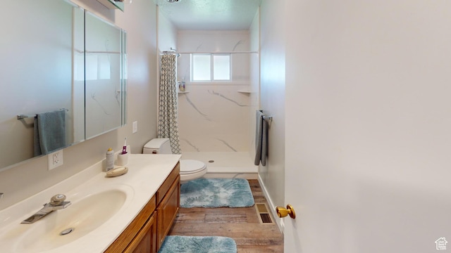 1207 S 600 W, Preston, ID 83263 - bathroom featuring vanity, a shower with curtain, and wood finished floors