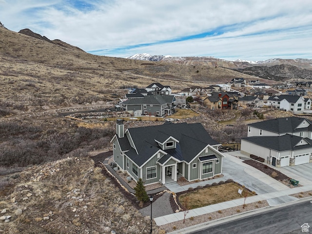 bird's eye view with a mountain view and a residential view