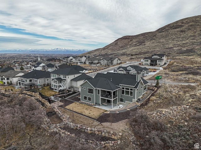bird's eye view with a residential view and a mountain view