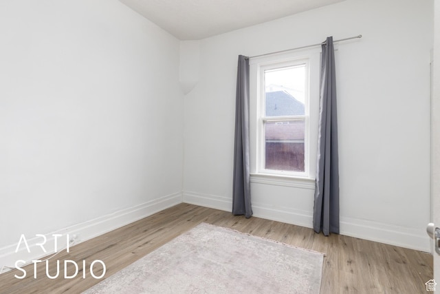 2516 S Orchard Ave, Ogden, UT 84401 - spare room with light wood-style flooring and baseboards