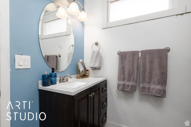 2516 S Orchard Ave, Ogden, UT 84401 - bathroom featuring a wealth of natural light and vanity