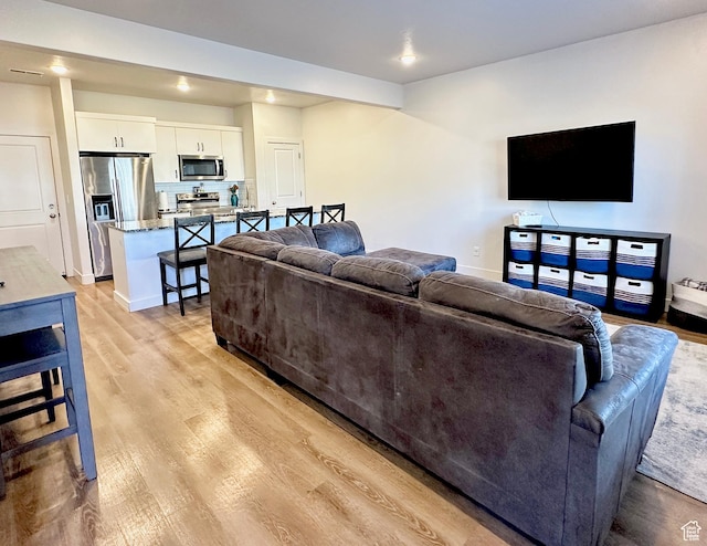 337 S 1540 E, Hyrum, UT 84319 - living room with light wood-type flooring and recessed lighting