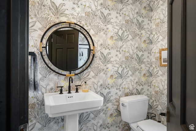 4673 Nelson Ct, Park City, UT 84098 - bathroom with wallpapered walls, toilet, and a sink