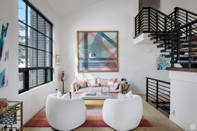 4673 Nelson Ct, Park City, UT 84098 - living area with wood finished floors, lofted ceiling, and baseboards