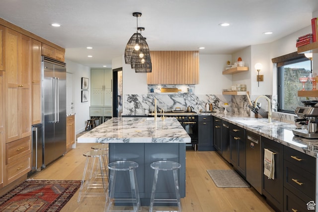 4673 Nelson Ct, Park City, UT 84098 - kitchen featuring high end appliances, a sink, light wood-type flooring, open shelves, and recessed lighting