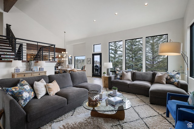 4673 Nelson Ct, Park City, UT 84098 - living room featuring high vaulted ceiling, a chandelier, stairs, plenty of natural light, and recessed lighting